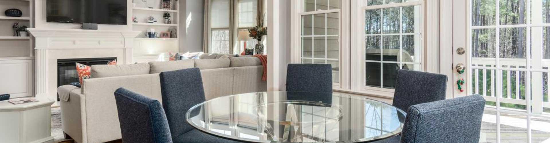 A Group of Chairs Around a Table in an Interior of a House